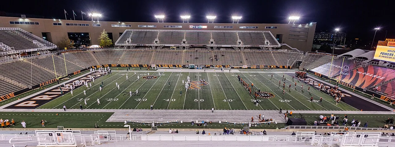 Princeton Stadium illuminated for a nighttime college football game