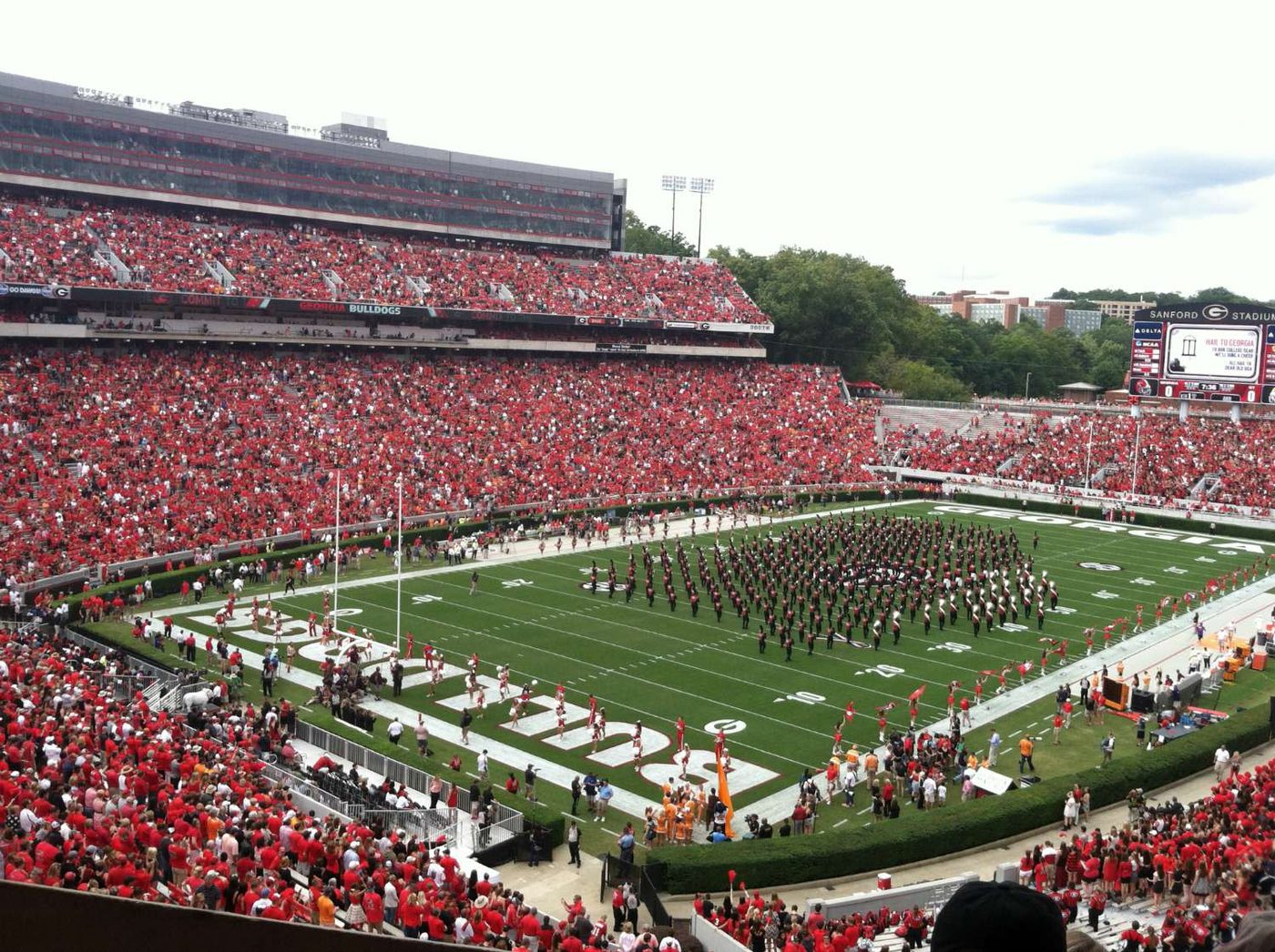 Sanford Stadium filled with supporters in red, the marching band formed up on the field before kickoff