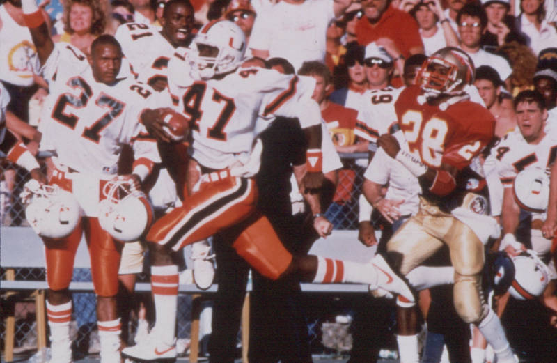 Historical Miami Hurricanes team celebration from the classic era